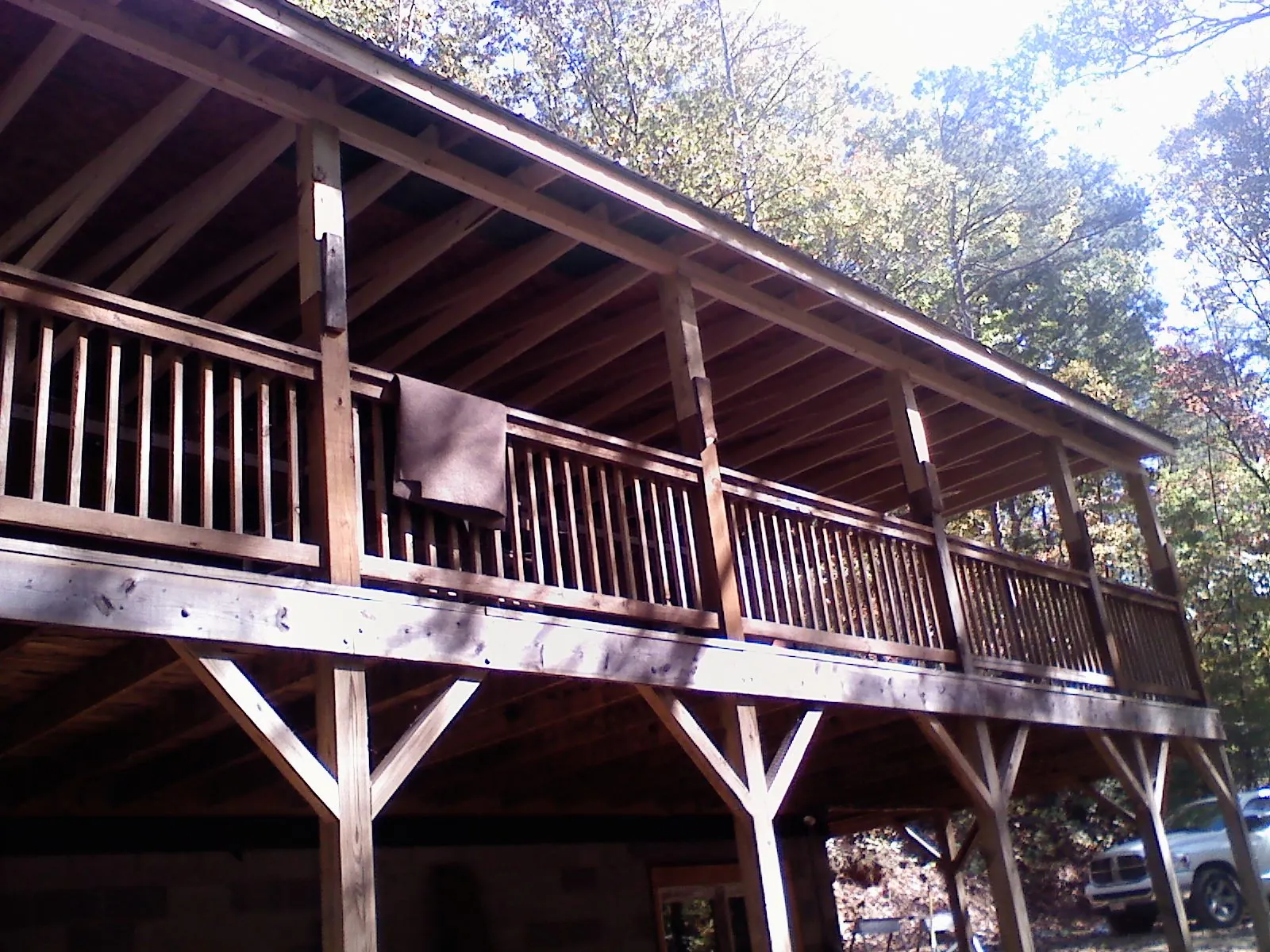 Timber framing under a new elevated porch and deck — Roof Leak Repair in New Enterprise by Roofing Brothers